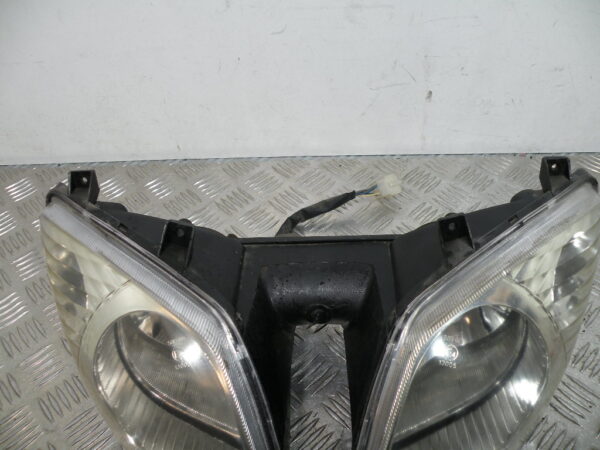 Optique / Phare avant PEUGEOT SUM UP 125 4t -2009-