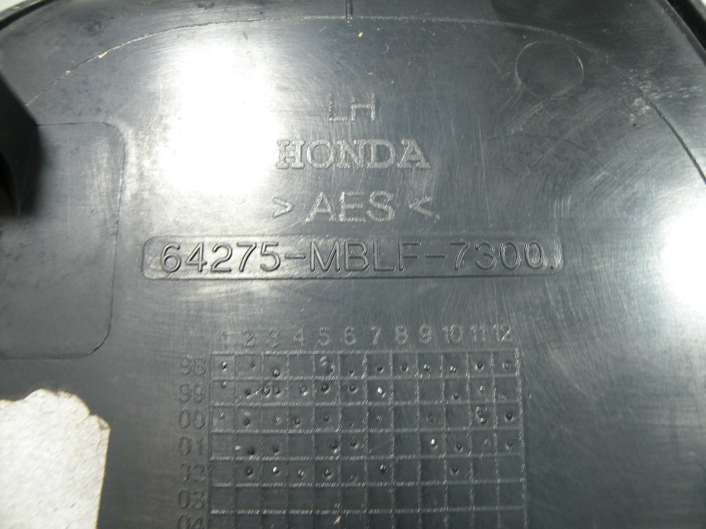 Cache latéral gauche HONDA 650 DEAUVILLE 4t -2003-